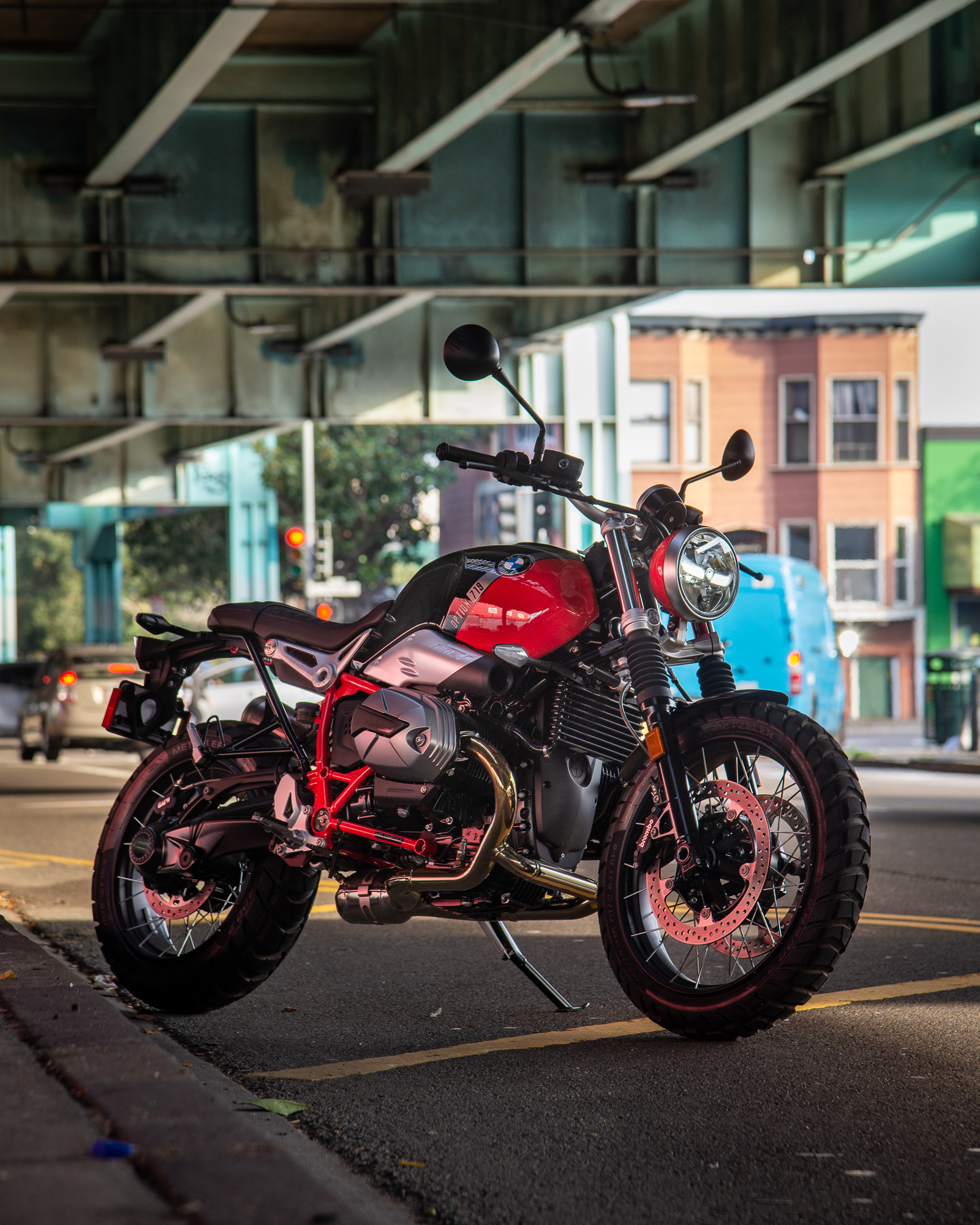 Red and Black 2023 BMW R nine T Under a Bridge